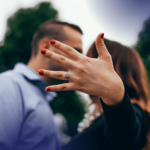 A Couple Showing Off Engagement Ring